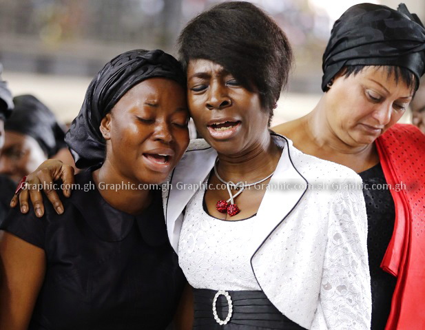 Lady Rev. Adelaide Heward-Mills (right) commiserating with Mrs Barbara Mahama, wife of the late Major Maxwell Mahama, at the thanksgiving service at the Lighthouse Chapel International, Qodesh in Accra